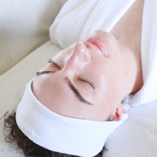 Client at a spa receiving the Osea Brightening Facial.